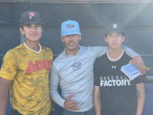 Doran Rivero with Coach Trosky (Infield)